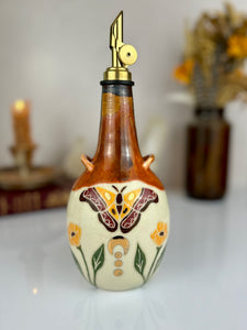 #8 Atlas Moth Oil Bottle